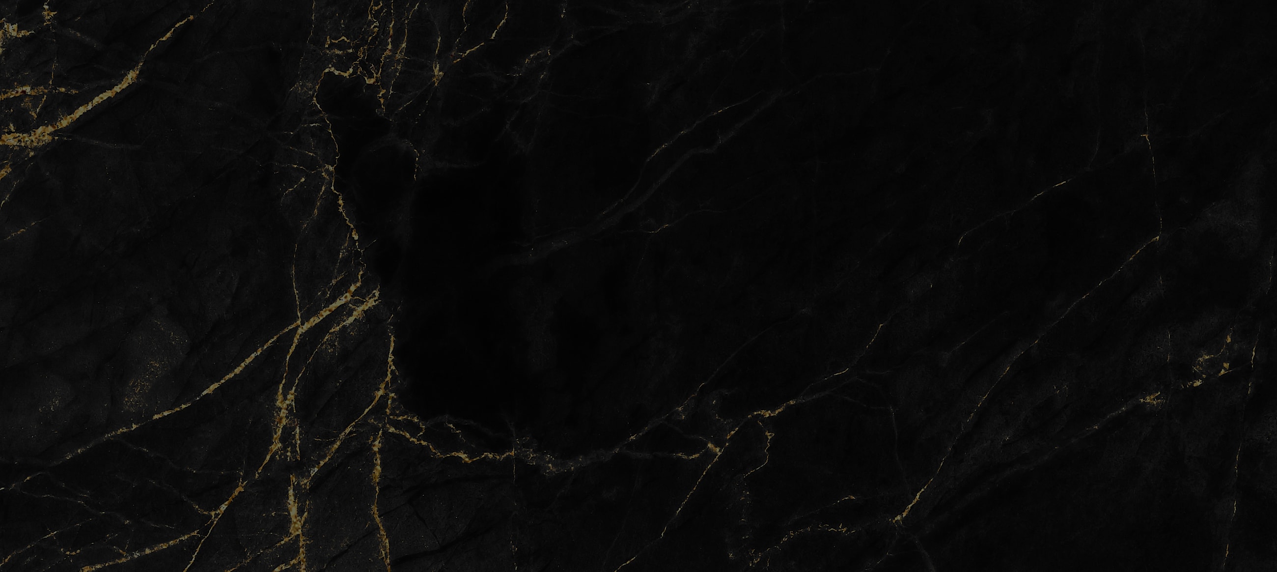 Black marble texture with gold veining details.