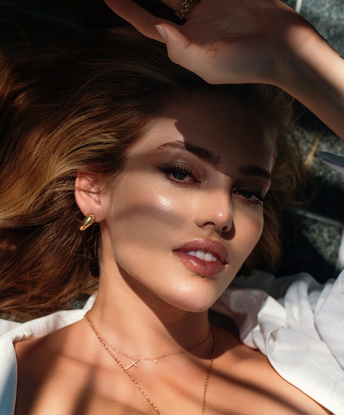 Woman with glowing skin in soft light.